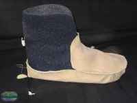 [sewing a mukluk]