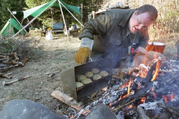 [baking sourdough biscuits in the reflector oven]